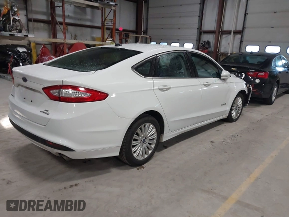 2013 Ford Fusion SE Hybrid with VIN 3FA6P0LU7DR254983, listed as a IAAI auction lot 41883531 with 188,585 mi miles and . Bid and sale history available at carsss.com. Image 4.