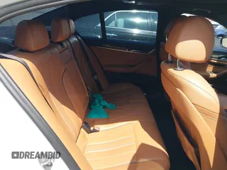 2018 BMW 5 Series 530i with VIN WBAJA5C5XJWA39179, listed as a IAAI auction lot 42380945 with 76,410 mi miles and . Bid and sale history available at DreamBid. Image 8.