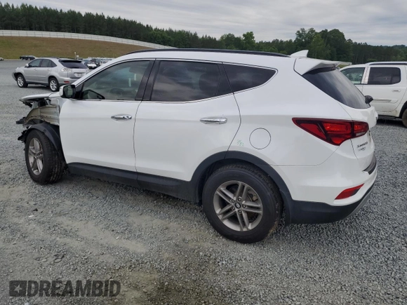 2018 Hyundai Santa Fe 2.4L z VIN 5NMZU3LB6JH104469, wystawiony jako Copart lot #57587495 z przebiegiem 78 267 mil mil oraz Szkoda całkowita • Salvage title. Historia ofert i sprzedaży dostępna na DreamBid. Obrazek 2.