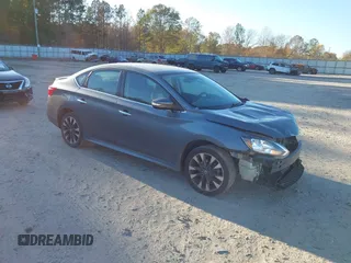 2019 Nissan Sentra S z VIN 3N1AB7APXKY265054, wystawiony jako IAAI lot #40929593 z przebiegiem 75 298 mil mil oraz . Historia ofert i sprzedaży dostępna na DreamBid. Obrazek 1.