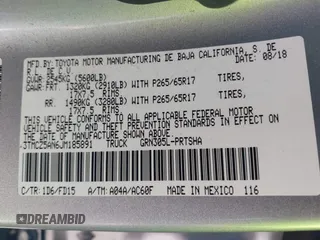 2018 Toyota Tacoma SR with VIN 3TMCZ5AN6JM185891, listed as a IAAI auction lot 41450665 with 53,749 mi miles and . Bid and sale history available at DreamBid. Image 9.