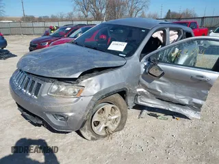 2014 Jeep Grand Cherokee Laredo with VIN 1C4RJFAG0EC289647, listed as a IAAI auction lot 41883914 with 176,501 mi miles and . Bid and sale history available at DreamBid. Image 2.