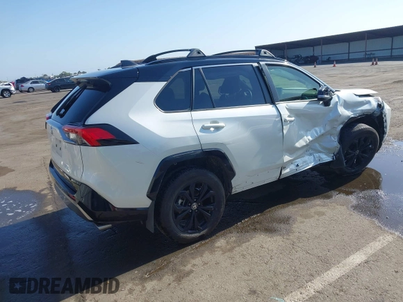 2022 Toyota RAV4 Hybrid XSE with VIN JTME6RFV9ND534822, listed as a IAAI auction lot 42477646 with 49,991 mi miles and . Bid and sale history available at DreamBid. Image 4.