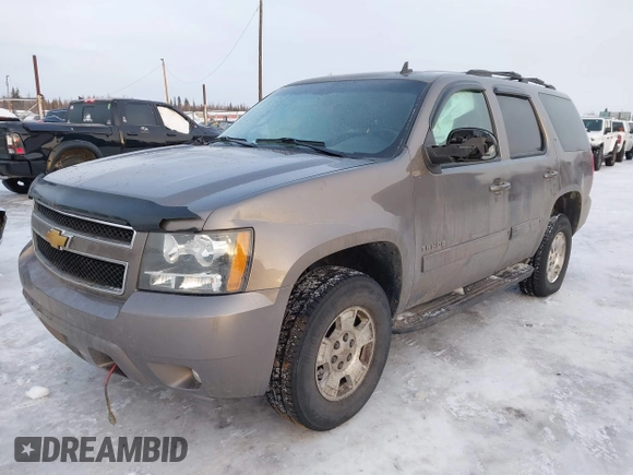 2013 Chevrolet Tahoe LT with VIN 1GNSKBE0XDR296094, listed as a IAAI auction lot 41448160 with 167,165 mi miles and . Bid and sale history available at DreamBid. Image 2.