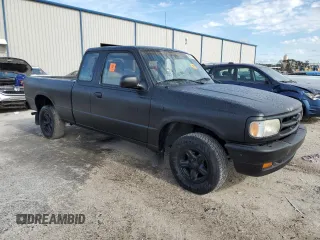 1996 Mazda B-Series 2WD Truck SE with VIN 4F4CR16U5TTM08135, listed as a Copart auction lot 86593474 with 127,430 mi miles and Salvage Title. Bid and sale history available at carsss.com. Image 4.