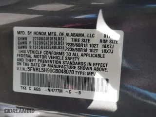 2012 Honda Odyssey Touring with VIN 5FNRL5H90CB048070, listed as a IAAI auction lot 41835799 with 162,288 mi miles. Bid and sale history available at carsss.com. Image 9.