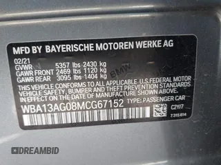 2021 BMW 5 Series 530e with VIN WBA13AG08MCG67152, listed as a IAAI auction lot 42619409 with 42,705 mi miles and . Bid and sale history available at DreamBid. Image 9.