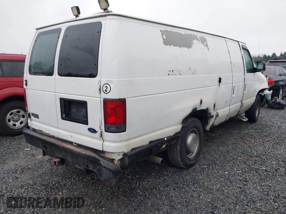 2004 Ford Econoline Cargo with VIN 1FTSS34L84HA56056, listed as a IAAI auction lot 41235862 with 215,095 mi miles and . Bid and sale history available at DreamBid. Image 4.