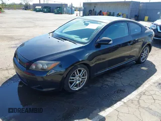 2009 Scion tC with VIN JTKDE167090284572, listed as a IAAI auction lot 41808769 with 132,474 mi miles. Bid and sale history available at carsss.com. Image 20.