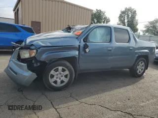 2006 Honda Ridgeline RTL z VIN 2HJYK16506H562423, wystawiony jako Copart lot #56783635 z przebiegiem Nie podano mil oraz Szkoda całkowita • Salvage title. Historia ofert i sprzedaży dostępna na DreamBid. Obrazek 1.