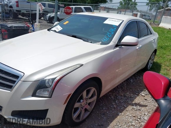 2013 Cadillac ATS with VIN 1G6AA5RA1D0139105, listed as a IAAI auction lot 42264614 with 69,049 mi miles and . Bid and sale history available at DreamBid. Image 2.