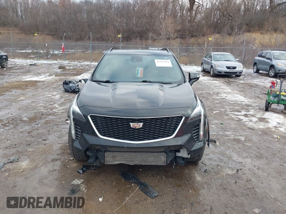 2021 Cadillac XT4 AWD Sport with VIN 1GYFZFR49MF065225, listed as a IAAI auction lot 41191994 with 58,095 mi miles and . Bid and sale history available at DreamBid. Image 12.
