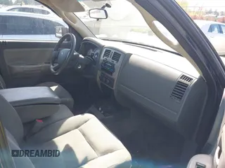 2006 Dodge Dakota SLT with VIN 1D7HW48NX6S708140, listed as a IAAI auction lot 42054527 with 226,944 mi miles and . Bid and sale history available at carsss.com. Image 5.