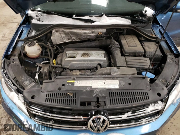 2017 Volkswagen Tiguan S z VIN WVGBV7AX4HK039281, wystawiony jako Copart lot #88013955 z przebiegiem 88 878 mil mil oraz Szkoda całkowita • Salvage title. Historia ofert i sprzedaży dostępna na DreamBid. Obrazek 13.