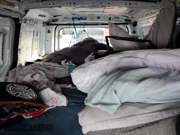 2018 Ford Transit Connect XL with VIN NM0LE7E75J1357681, listed as a Copart auction lot 82233674 with 90,725 mi miles and Salvage title. Bid and sale history available at DreamBid. Image 10.