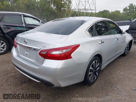 2018 Nissan Altima SR with VIN 1N4AL3AP6JC151861, listed as a IAAI auction lot 40010666 with 140,228 mi miles and . Bid and sale history available at DreamBid. Image 4.