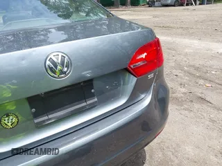 2014 Volkswagen Jetta SE with VIN 3VWD07AJ0EM236487, listed as a IAAI auction lot 42714441 with 124,596 mi miles and . Bid and sale history available at DreamBid. Image 12.