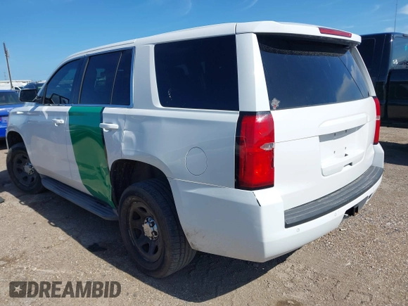 2015 Chevrolet Tahoe Commercial z VIN 1GNLC2EC8FR255526, wystawiony jako IAAI lot #42538320 z przebiegiem 165 502 mil mil oraz . Historia ofert i sprzedaży dostępna na DreamBid. Obrazek 6.