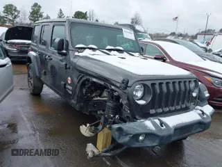 2019 Jeep Wrangler Unlimited Sport S z VIN 1C4HJXDG5KW505015, wystawiony jako IAAI lot #41560088 z przebiegiem 54 193 mil mil oraz . Historia ofert i sprzedaży dostępna na DreamBid. Obrazek 1.