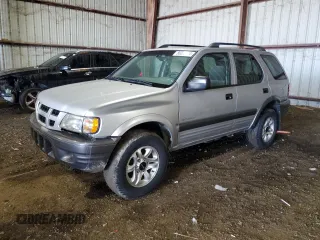 2003 Isuzu Rodeo with VIN 4S2CK58W834304403, listed as a Copart auction lot 86026704 with 62,011 mi miles and Clean Title. Bid and sale history available at DreamBid. Image 1.