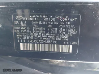 2017 Hyundai Tucson Value with VIN KM8J33A25HU586191, listed as a IAAI auction lot 41682127 with 58,877 mi miles. Bid and sale history available at carsss.com. Image 9.