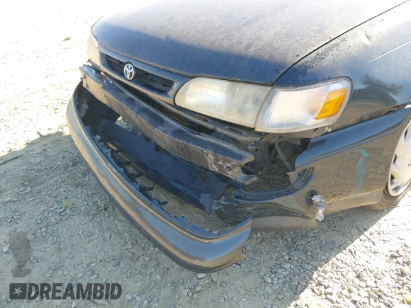1997 Toyota Corolla with VIN 2T1BA02E0VC162383, listed as a IAAI auction lot 40715985 with 141,713 mi miles and . Bid and sale history available at DreamBid. Image 6.