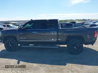 2016 GMC Sierra 1500 SLT with VIN 3GTU2NEC4GG285688, listed as a IAAI auction lot 40394598 with 121,940 mi miles and . Bid and sale history available at DreamBid. Image 14.