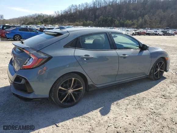 2021 Honda Civic Hatchback Sport with VIN SHHFK7H40MU225142, listed as a Copart auction lot 46683385 with 66,346 mi miles and Salvage Title. Bid and sale history available at carsss.com. Image 3.