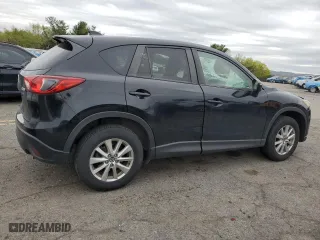 2015 Mazda CX-5 Touring with VIN JM3KE4CY3F0475757, listed as a Copart auction lot 53477875 with 104,546 mi miles and Salvage Title. Bid and sale history available at carsss.com. Image 3.
