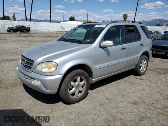 2004 Mercedes-Benz M-Class with VIN 4JGAB75EX4A470494, listed as a Copart auction lot 52024515 with 185,639 mi miles and Salvage Title. Bid and sale history available at carsss.com. Image 1.