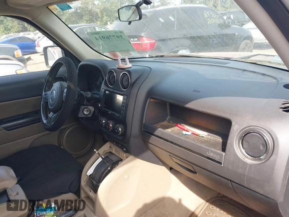 2015 Jeep Patriot High Altitude with VIN 1C4NJRFB5FD376338, listed as a IAAI auction lot 40358411 with 85,019 mi miles and . Bid and sale history available at carsss.com. Image 5.
