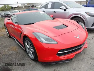 2015 Chevrolet Corvette 1LT z VIN 1G1YA2D77F5122992, wystawiony jako IAAI lot #42386670 z przebiegiem 59 722 mil mil oraz . Historia ofert i sprzedaży dostępna na DreamBid. Obrazek 1.