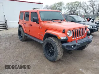 2020 Jeep Wrangler Unlimited Sahara with VIN 1C4HJXENXLW231194, listed as a IAAI auction lot 42083147 with 34,166 mi miles. Bid and sale history available at carsss.com. Image 1.