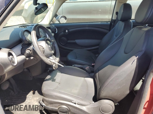 2012 MINI Hardtop with VIN WMWSU3C5XCT261853, listed as a Copart auction lot 49980285 with 110,638 mi miles and Salvage Title. Bid and sale history available at DreamBid. Image 7.