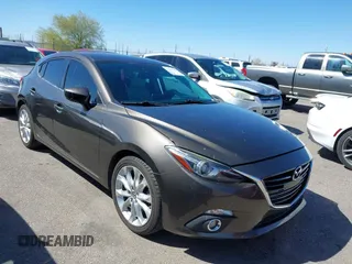 2015 Mazda 3 S Grand Touring with VIN JM1BM1M35F1254300, listed as a IAAI auction lot 41827092 with 65,908 mi miles and . Bid and sale history available at DreamBid. Image 1.