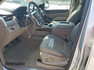 2016 GMC Yukon SLT with VIN 1GKS1BKC1GR413225, listed as a Copart auction lot 66547034 with 56,073 mi miles and Salvage Title. Bid and sale history available at carsss.com. Image 7.