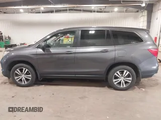 2018 Honda Pilot EX-L with VIN 5FNYF6H52JB052141, listed as a IAAI auction lot 41452260 with 113,382 mi miles. Bid and sale history available at carsss.com. Image 14.