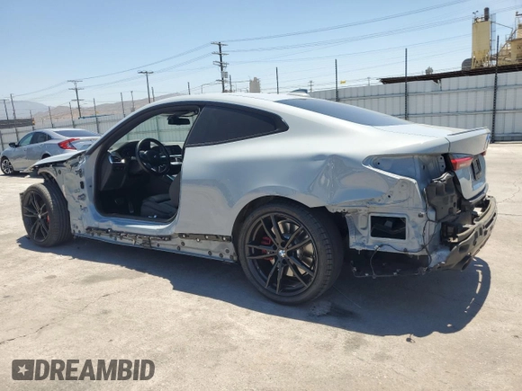2022 BMW 4 Series 430i with VIN WBA53AP03NCJ59994, listed as a Copart auction lot 63267865 with 33,328 mi miles and Salvage title. Bid and sale history available at DreamBid. Image 2.