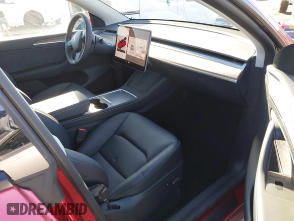 2025 Tesla Model Y Long Range with VIN 7SAYGDED8SF223993, listed as a IAAI auction lot 41743146 with 4,866 mi miles and . Bid and sale history available at DreamBid. Image 5.