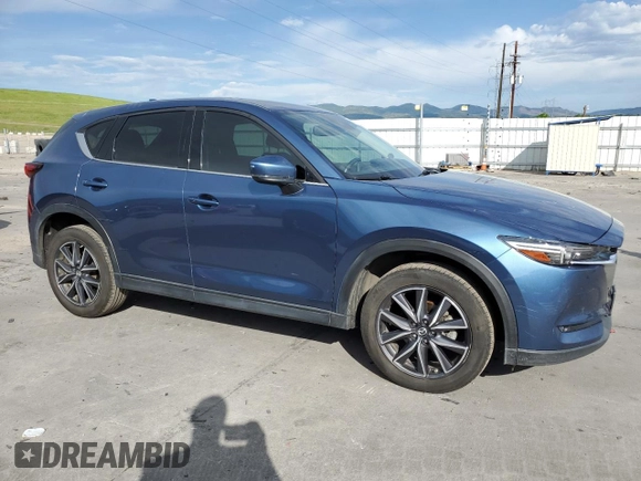2018 Mazda CX-5 Grand Touring with VIN JM3KFBDM2J0347208, listed as a Copart auction lot 59357135 with 61,537 mi miles and Clean title. Bid and sale history available at DreamBid. Image 4.