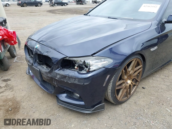 2015 BMW 5 Series 528i with VIN WBA5A5C57FD513039, listed as a IAAI auction lot 42262592 with 79,328 mi miles and . Bid and sale history available at DreamBid. Image 6.