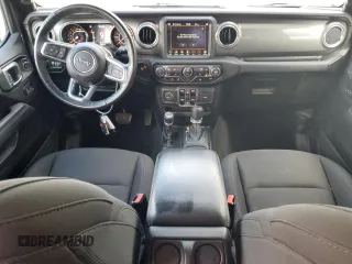 2022 Jeep Wrangler Unlimited Sahara Altitude with VIN 1C4HJXEG9NW269598, listed as a Copart auction lot 80495964 with 23,869 mi miles and Salvage title. Bid and sale history available at DreamBid. Image 8.