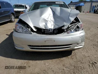 2002 Toyota Camry LE z VIN 4T1BE32K02U084676, wystawiony jako Copart lot #49712395 z przebiegiem 74 049 mil mil oraz Czysty tytuł • Clean title. Historia ofert i sprzedaży dostępna na DreamBid. Obrazek 5.