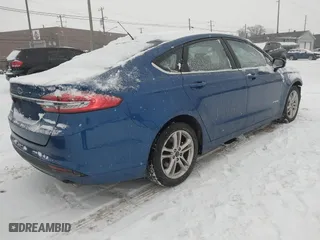 2018 Ford Fusion Hybrid S with VIN 3FA6P0UU8JR122342, listed as a IAAI auction lot 41355323 with 85,304 mi miles. Bid and sale history available at carsss.com. Image 4.