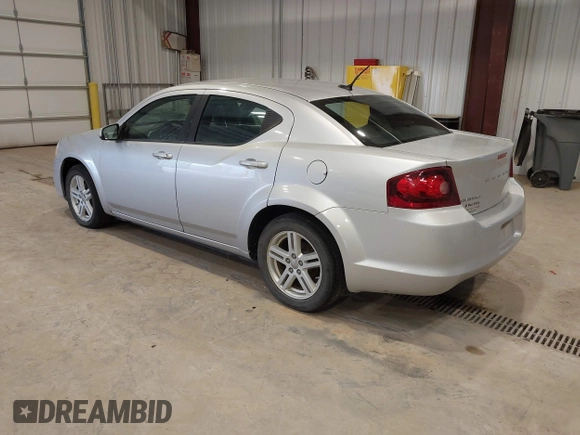 2012 Dodge Avenger SXT with VIN 1C3CDZCB5CN219812, listed as a IAAI auction lot 41928110 with 200,557 mi miles and . Bid and sale history available at carsss.com. Image 3.