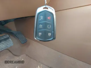 2015 Cadillac Escalade ESV Platinum z VIN 1GYS4UKJ3FR564718, wystawiony jako IAAI lot #41085166 z przebiegiem Nie podano mil oraz . Historia ofert i sprzedaży dostępna na DreamBid. Obrazek 11.