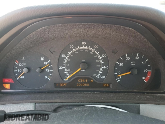 1999 Mercedes-Benz E-Class with VIN WDBJF65H9XA903481, listed as a Copart auction lot 79516914 with 201,080 mi miles and Salvage Title. Bid and sale history available at carsss.com. Image 9.