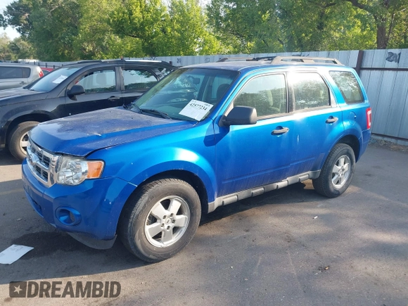 2011 Ford Escape XLS with VIN 1FMCU0C78BKC16059, listed as a IAAI auction lot 42577234 with 210,890 mi miles and . Bid and sale history available at DreamBid. Image 2.