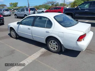 1998 Nissan Maxima GXE z VIN JN1CA21D6WT510015, wystawiony jako IAAI lot #42004731 z przebiegiem 114 575 mil mil oraz . Historia ofert i sprzedaży dostępna na DreamBid. Obrazek 3.