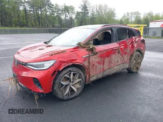 2023 Volkswagen ID.4 Pro S z VIN 1V2FMPE83PC010566, wystawiony jako IAAI lot #42255980 z przebiegiem Nie podano mil oraz . Historia ofert i sprzedaży dostępna na DreamBid. Obrazek 2.
